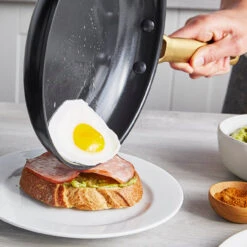 GreenPan - Reserve Black 3 PC 8", 9.5" & 11" Non Stick Fry Pan Set -Home Kitchen Store GP Reserve Blck 3pcFrypanSet EggSlide 1 1200x1200 29c7df47 26fc 4fa7 ab63 900d96ed986f 600x 34672.1712332150